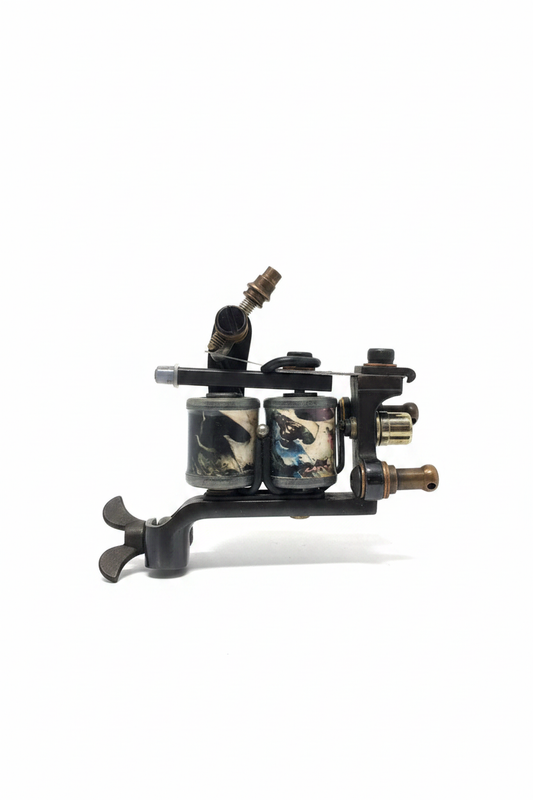 Tattoo machine on white background